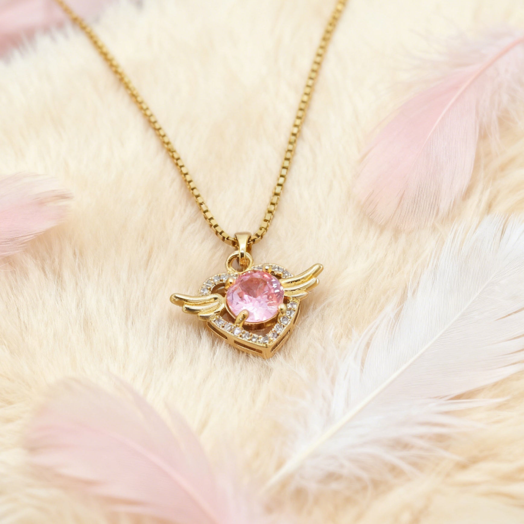 “Étreinte” Angel Heart Pendant Necklace — 18K Gold‑Plated, Pink Diamond‑Style