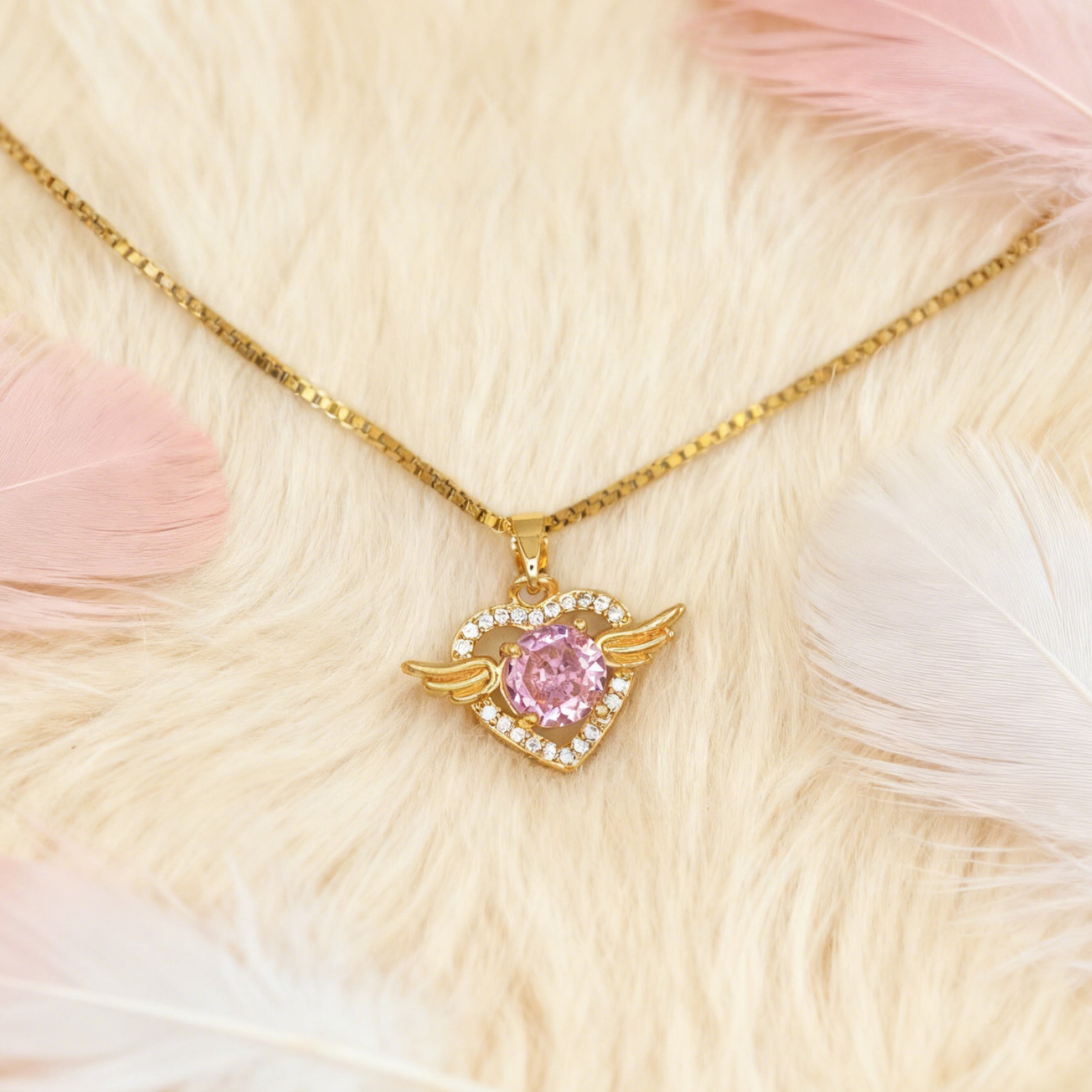 “Étreinte” Angel Heart Pendant Necklace — 18K Gold‑Plated, Pink Diamond‑Style